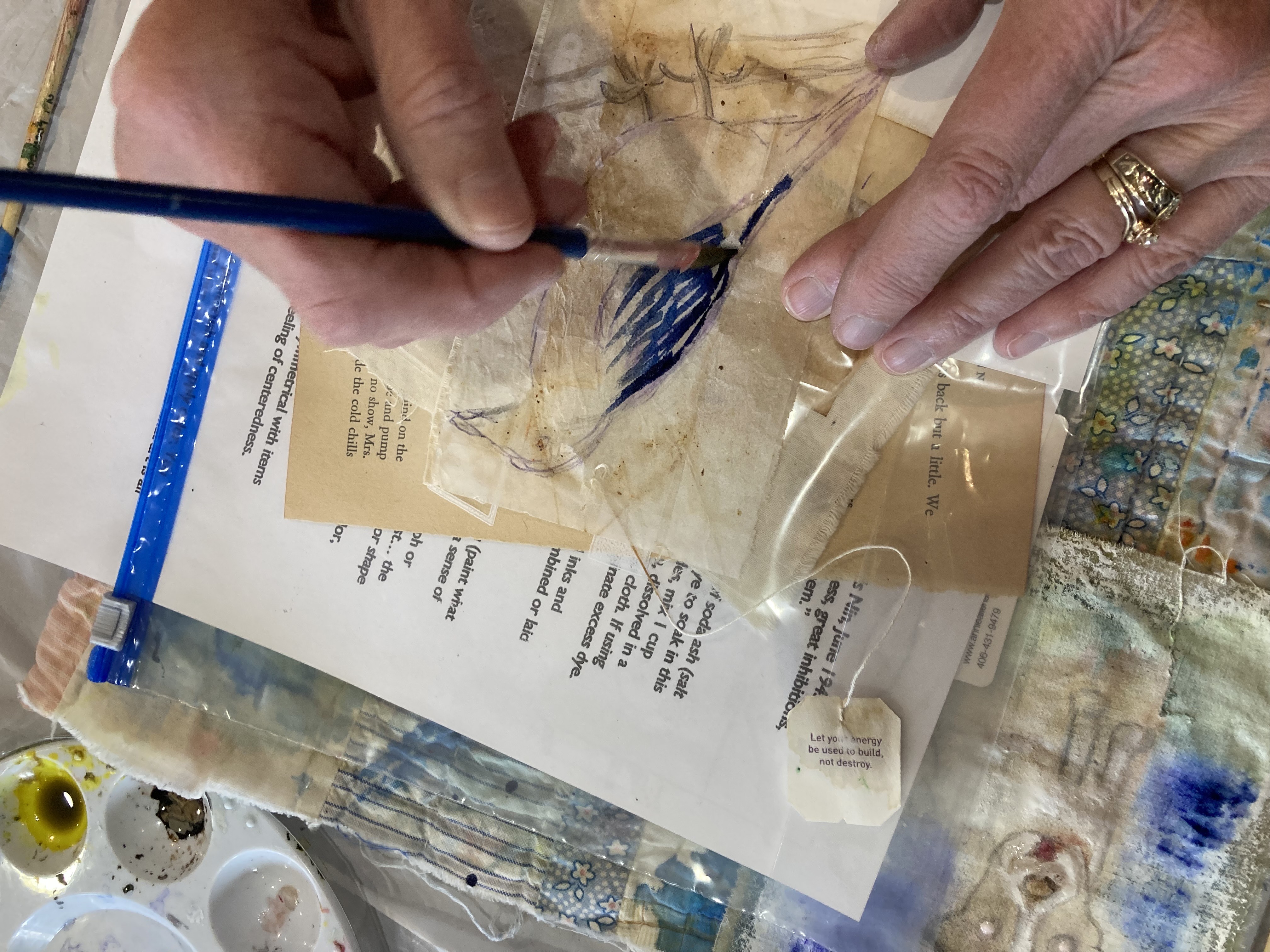 Creative aging participant painting a bird